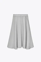 JUPE MIDI FLUIDE VOLUME