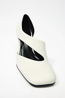 ASYMMETRIC LEATHER HEELS