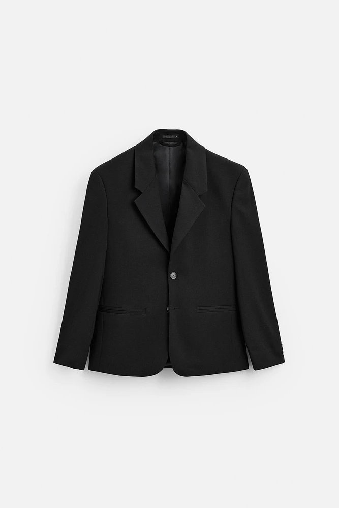 TEXTURED SUIT JACKET