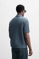 INTERLOCK TEXTURED POLO