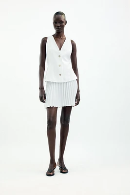 ROBE COURTE EN MATIÈRES VARIÉES