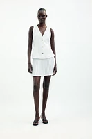 ROBE COURTE EN MATIÈRES VARIÉES