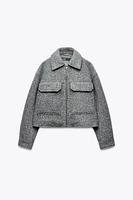 VESTE COURTE BOUCLÉE