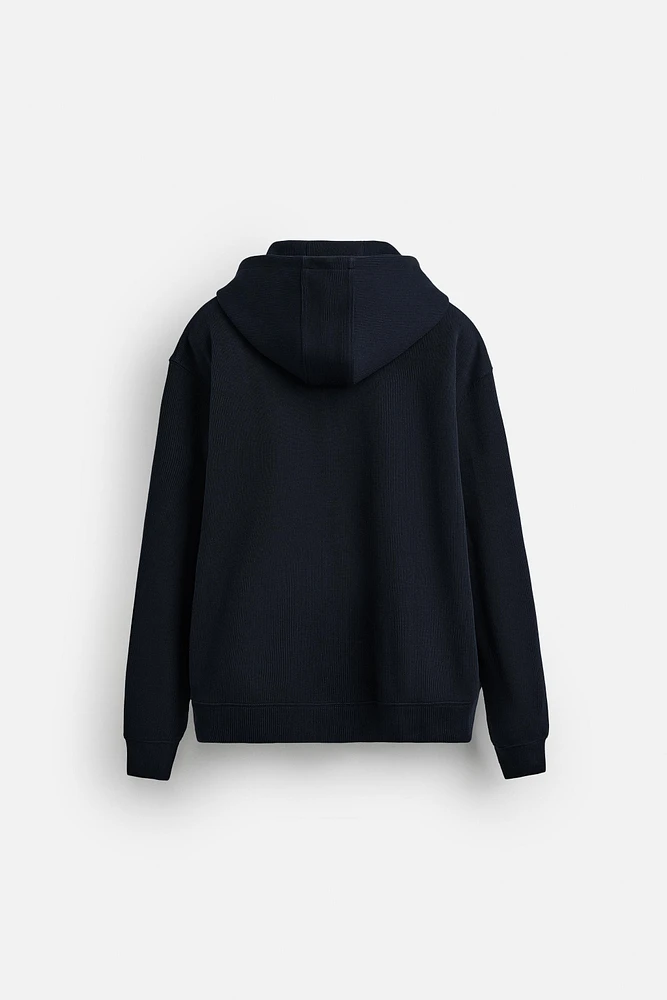 SWEAT À CAPUCHE ET ZIP