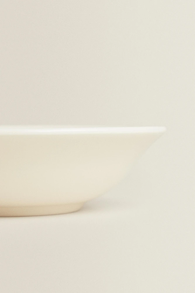 EARTHENWARE BOWL WITH RAISED-DESIGN EDGE