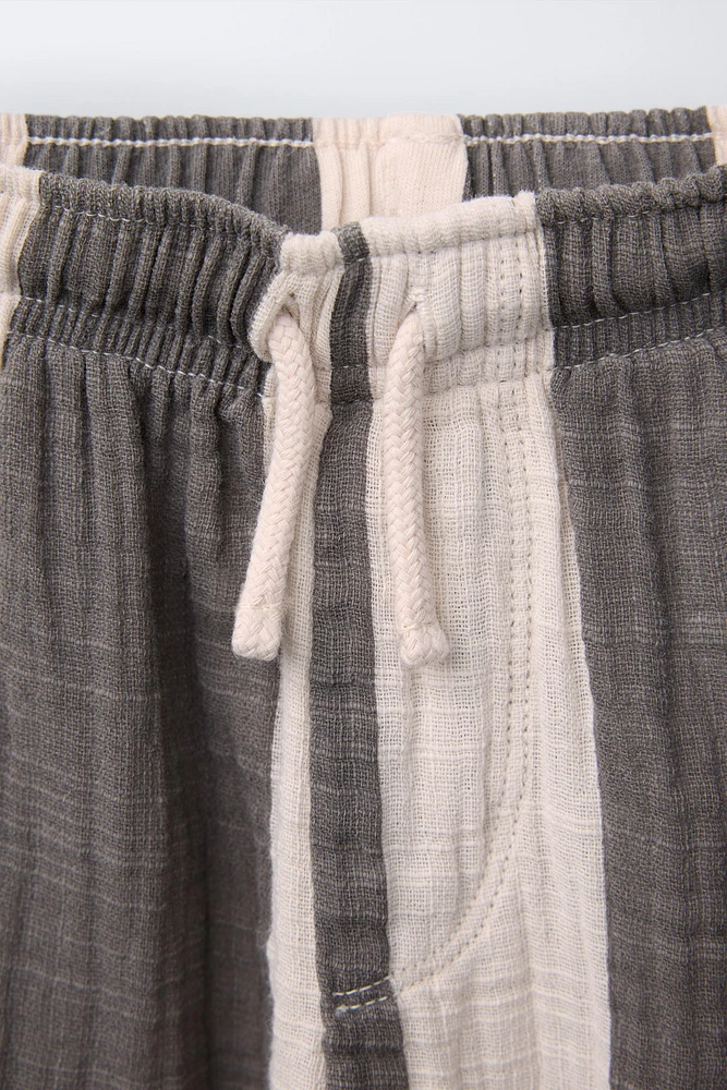 STRIPED COMBINATION PANTS