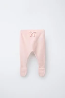 BOW KNIT FOOTED LEGGINGS