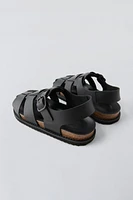 LEATHER CAGE SANDALS