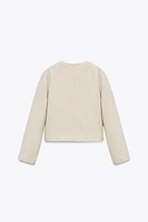 VESTE BOUCLÉ À BOUTONS