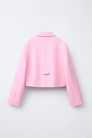 VESTE COURTE À NŒUDS