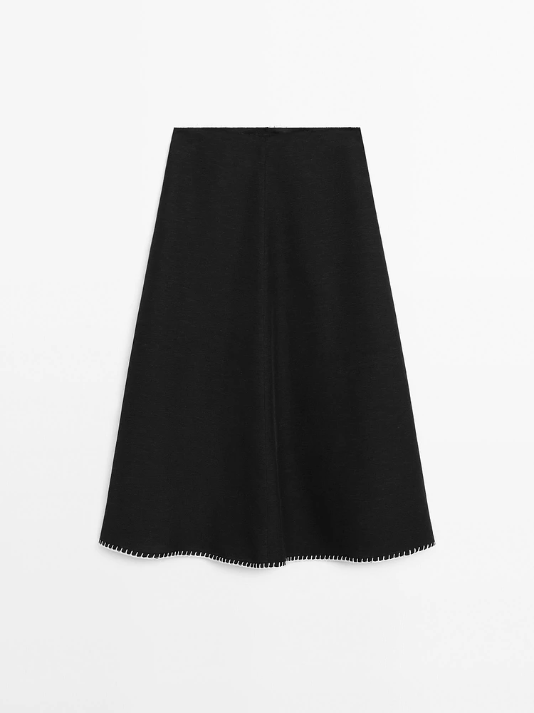 Midi skirt with topstitching detail on the hem