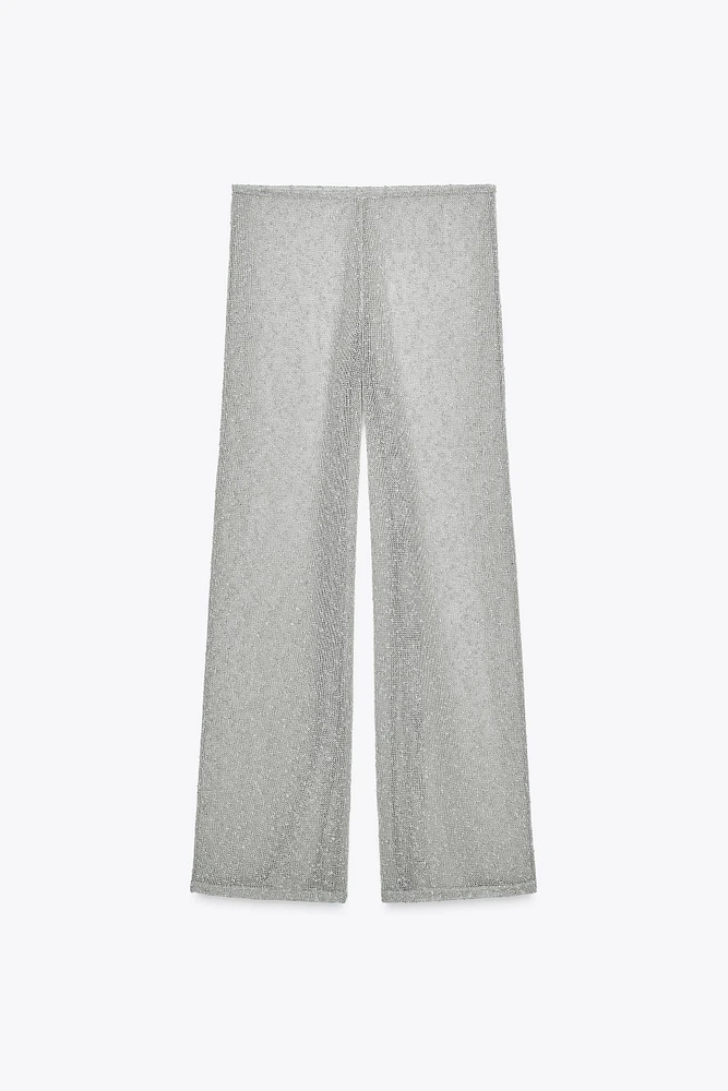 PANTALON LARGE EN MAILLE COUPÉE