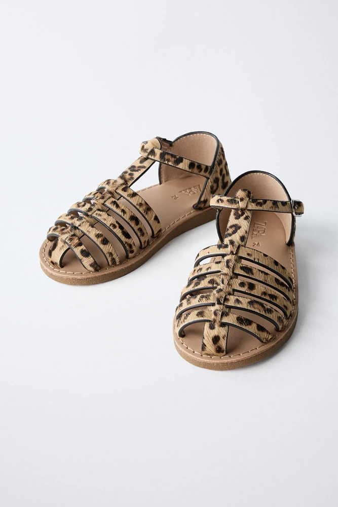SANDALES STYLE PLAGE EN CUIR ANIMAL PRINT
