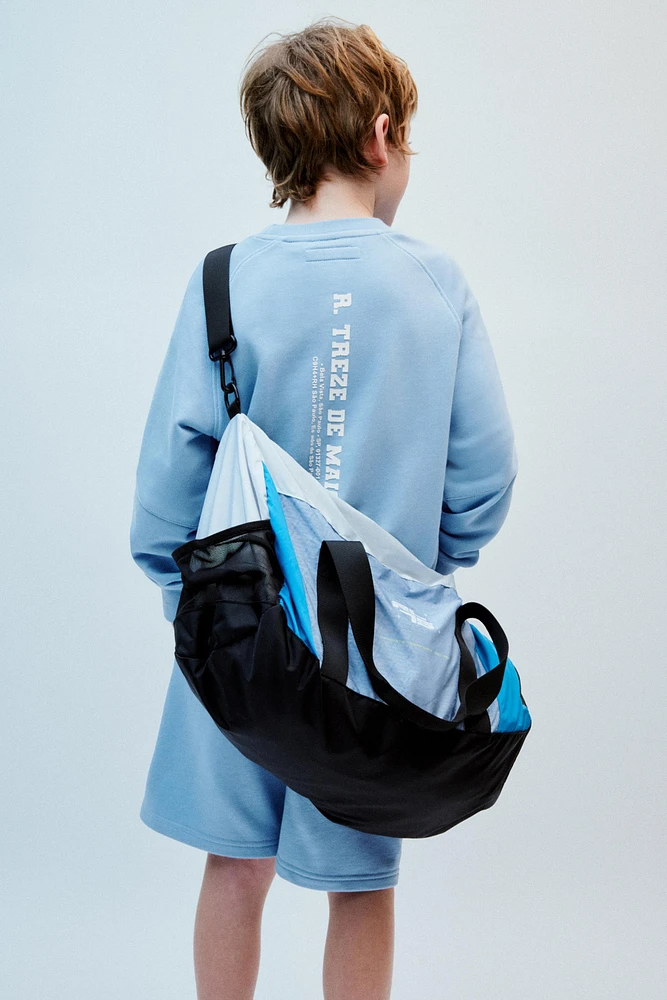 RAISED NUMBER SWEATSHIRT