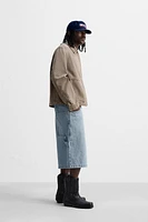 VESTE DÉLAVÉE CLOUS