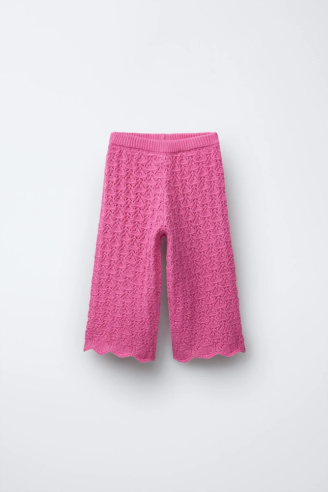 PANTALON EN MAILLE AJOURÉE