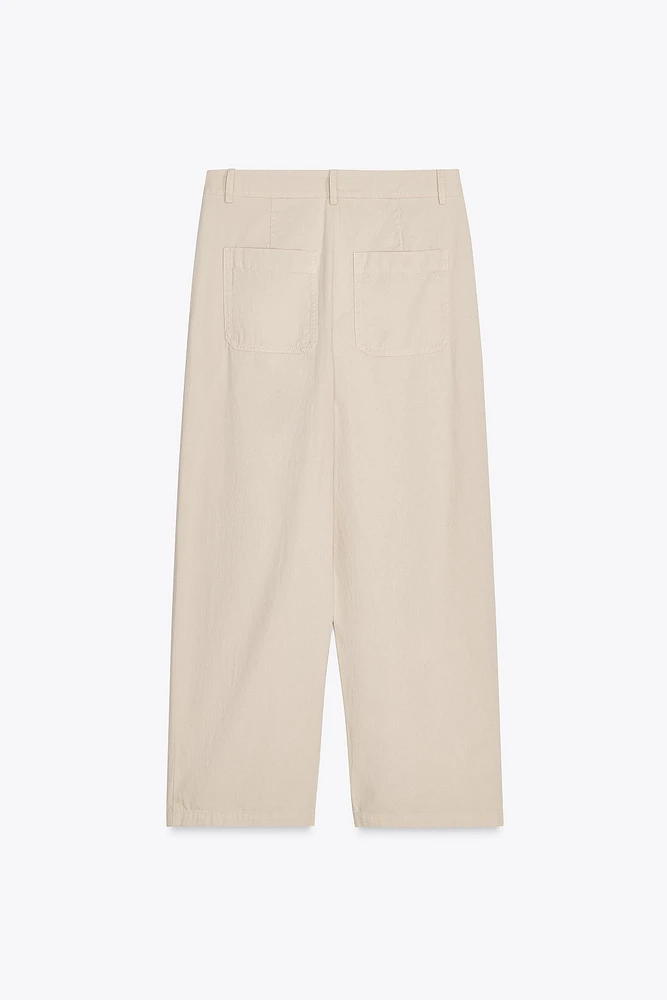 PANTALON CHINO À PINCES