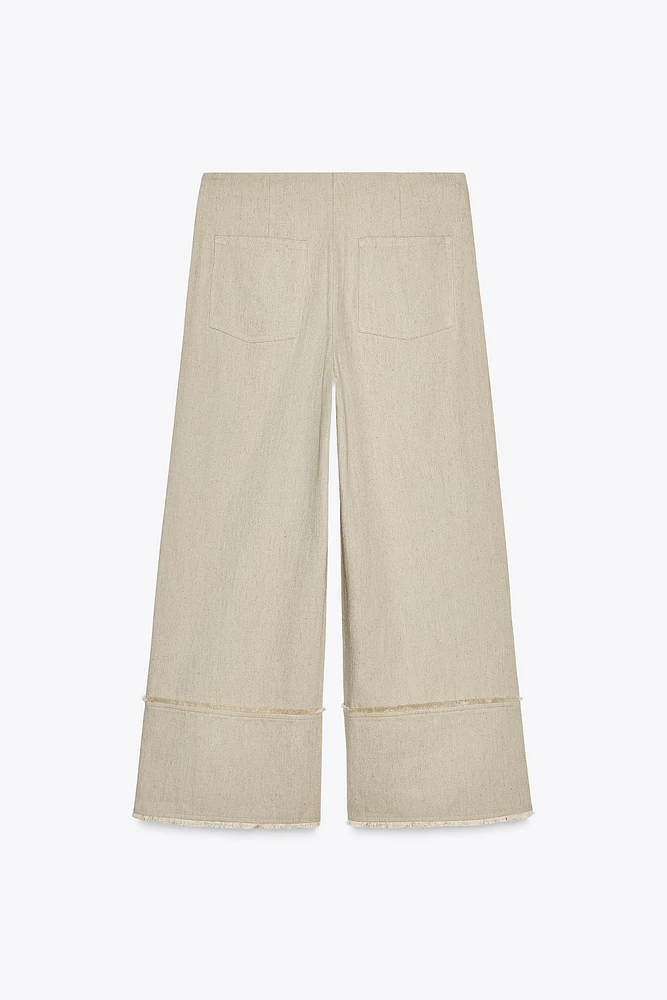 PANTALON RUSTIQUE EFFRANGÉ