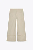 PANTALON RUSTIQUE EFFRANGÉ