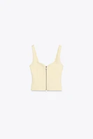 TOP INTERLOCK ZIP