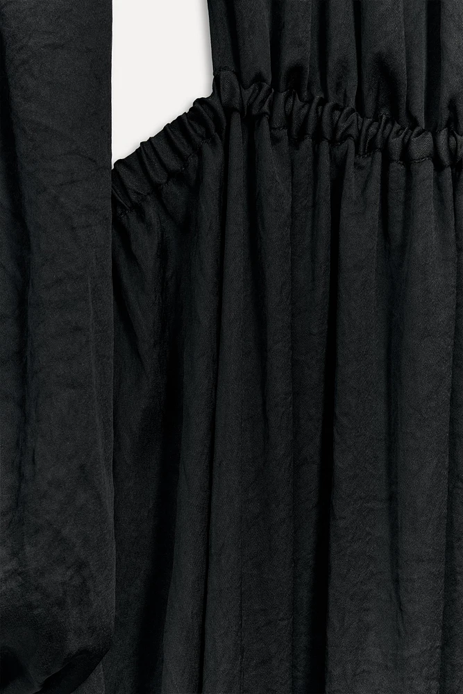 ROBE À DOS NU 50E ANNIVERSAIRE