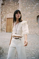 TOP ASYMÉTRIQUE BRODÉ