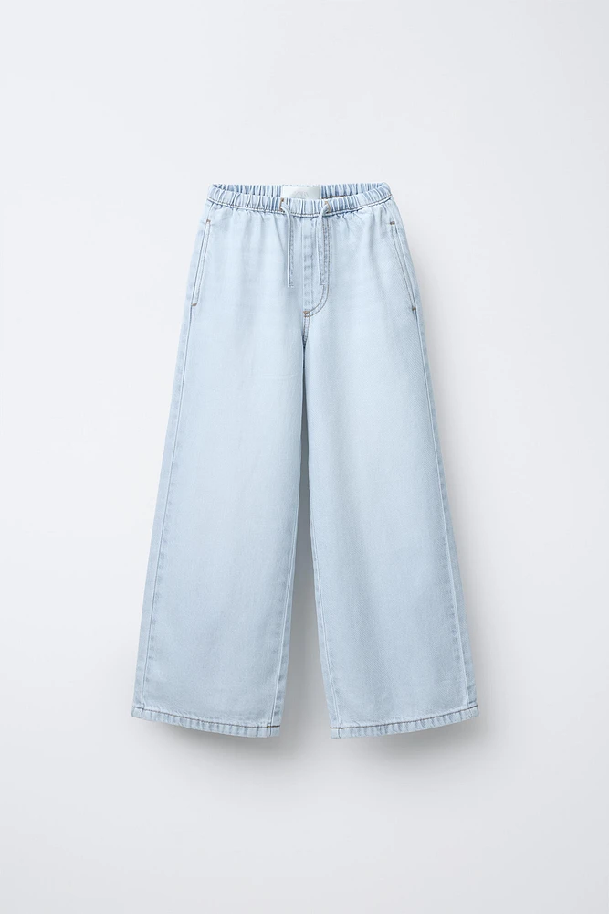 JEAN LARGE À TAILLE FINE