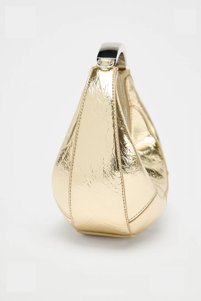 SAC OVALE AVEC ANSE MÉTALLIQUE