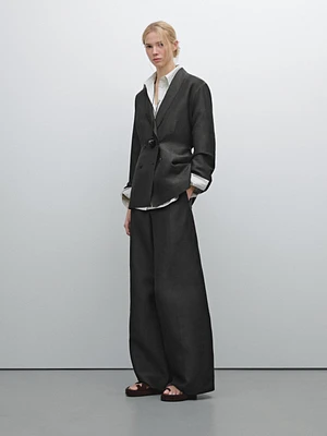 Flowing wide-leg trousers with seam details