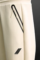 TECHNICAL ZIPPER JOGGER PANTS