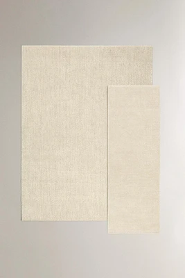 RECTANGULAR DOUBLE BOUCLÉ JUTE AREA RUG