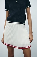 PLEATED MINI SKIRT