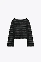 PULL COURT EN MAILLE POINTELLE