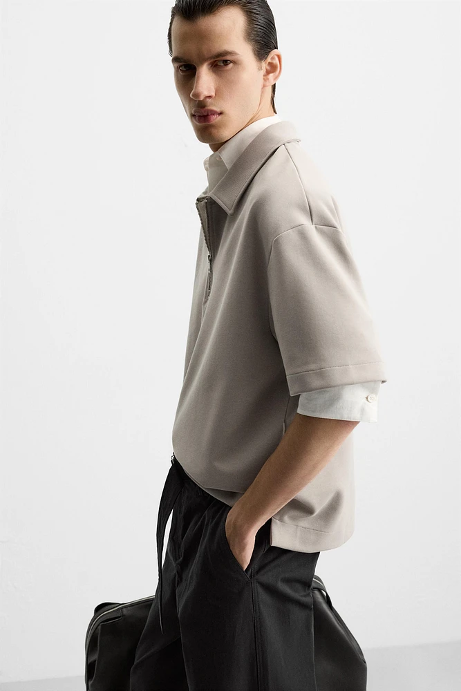 TECHNICAL ZIP POLO SHIRT