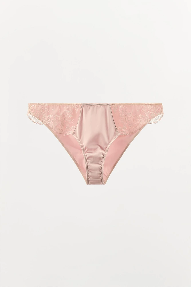 CULOTTE EN MATIÈRES VARIÉES BRODÉES