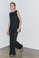 PANTALON EN MAILLE POINTELLE LATÉRAL