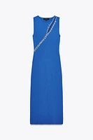 CUT OUT KNIT DRESS WITH JEWELS