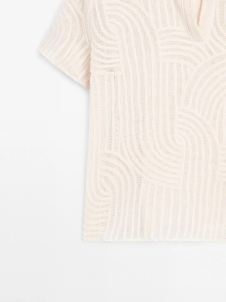 Polo en maille ajourée avec broderie