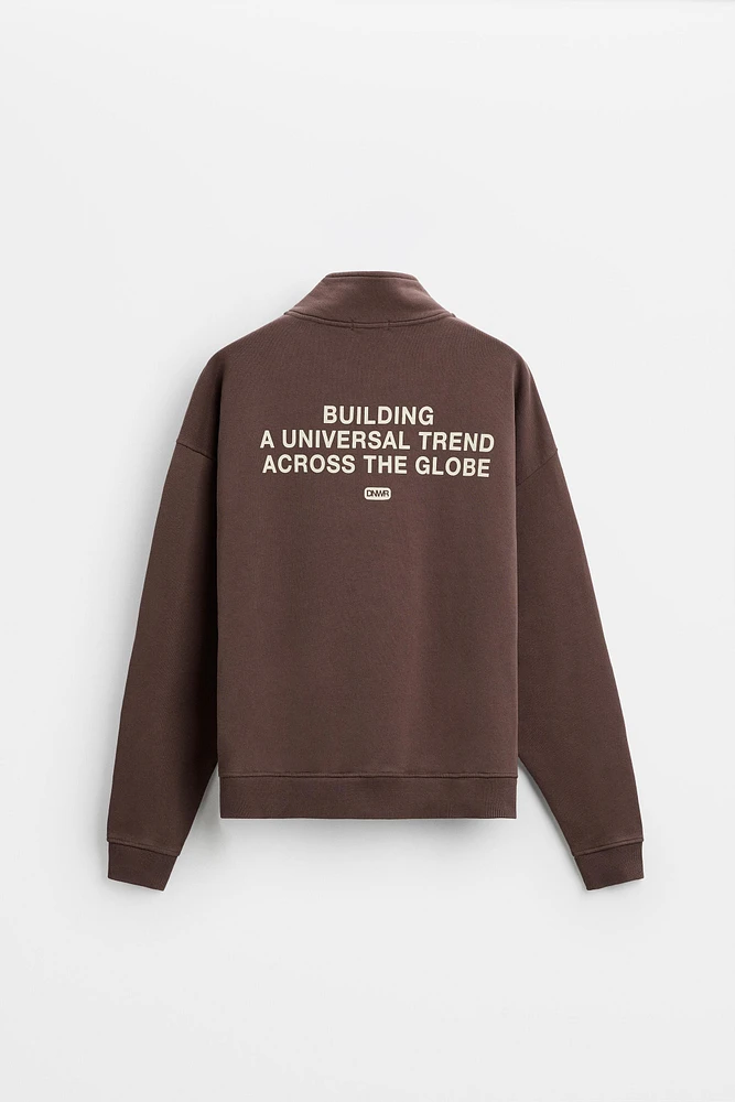 TEXT QUARTER ZIP SWEATSHIRT