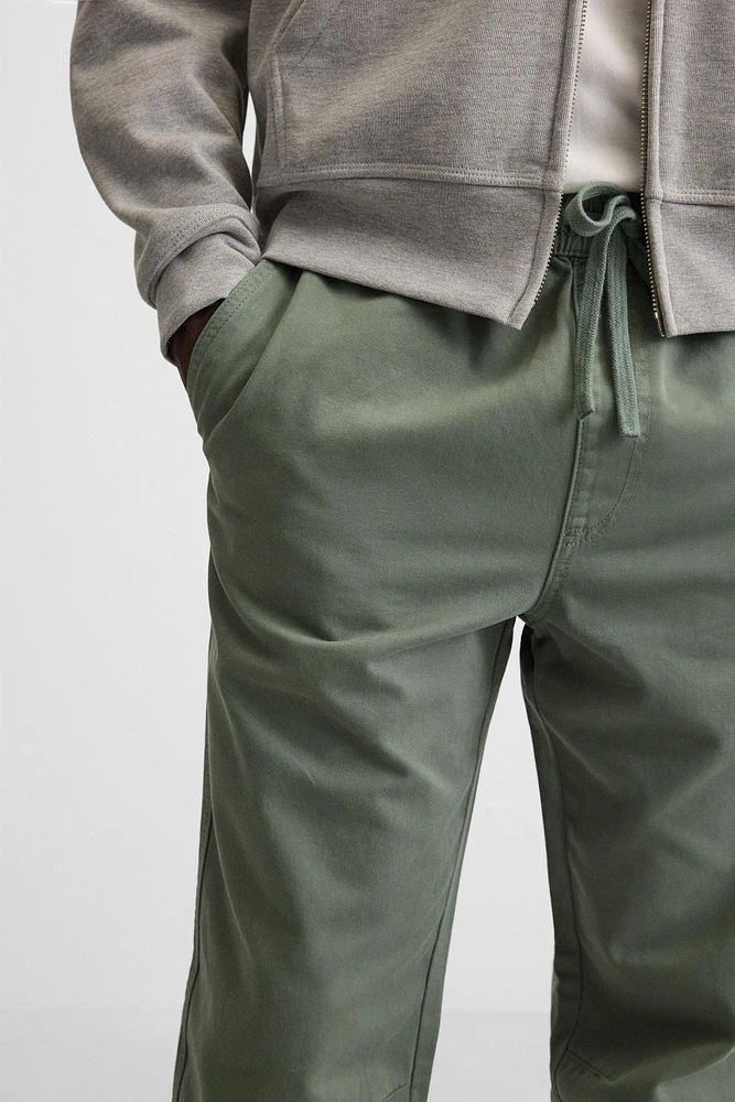 PANTALON DÉLAVÉ AVEC TAILLE JOGGING