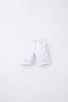 BERMUDA EN DENIM DÉCHIRÉ