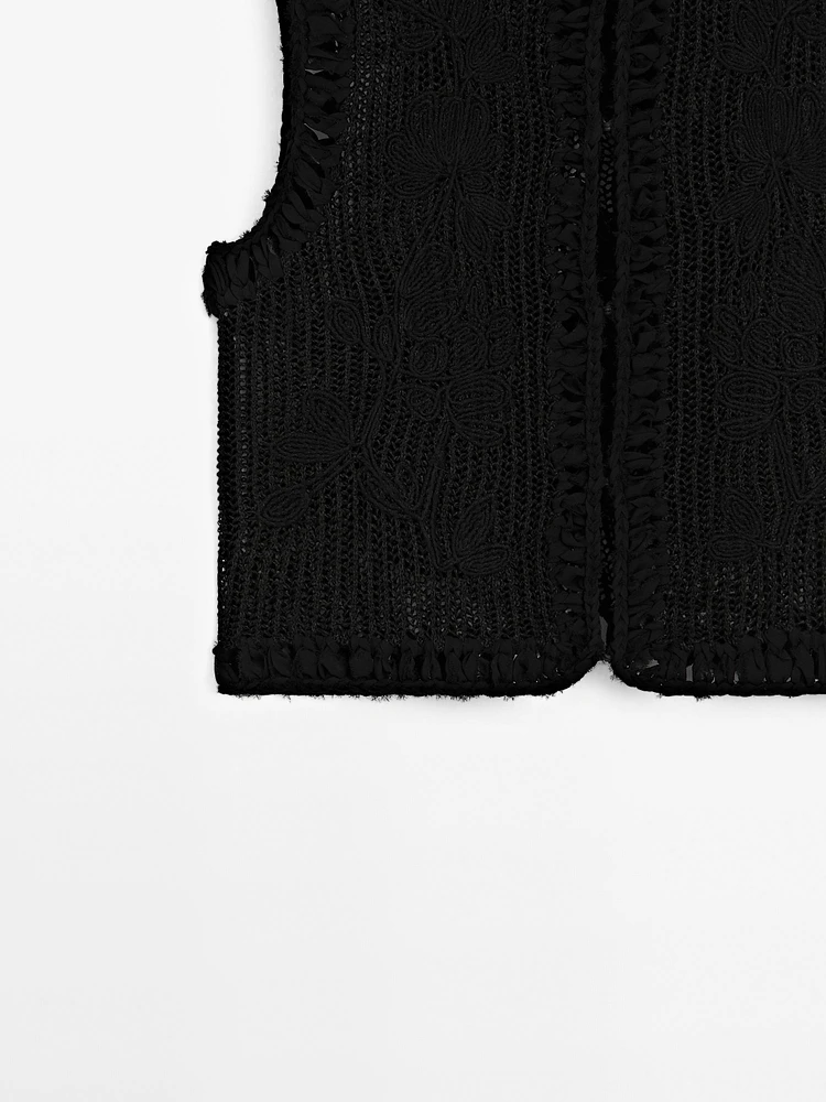Knit vest with embroidered detail