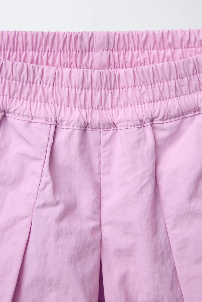 TECHNICAL PLEATED SKORT