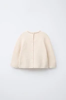 PULL EN MAILLE À MAILLES LINKS ET FLEURS BRODÉES