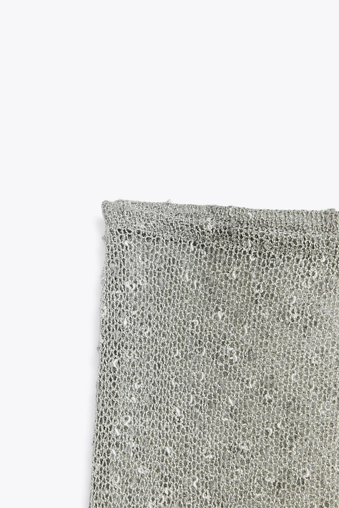 PANTALON LARGE EN MAILLE COUPÉE
