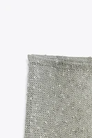 PANTALON LARGE EN MAILLE COUPÉE