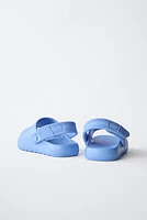 RUBBER SLINGBACK SANDALS