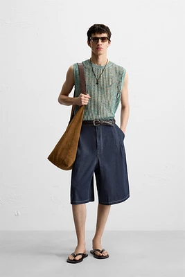 GILET SANS MANCHES EN MAILLE AJOURÉE