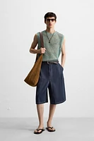 GILET SANS MANCHES EN MAILLE AJOURÉE