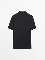 Polo en maille de laine mélangée à manches courtes